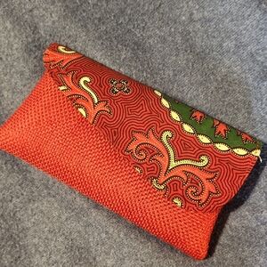 Like New Red and Green Patterned Clutch